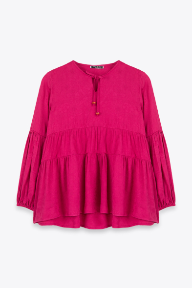BLOUSE À DÉCOUPES