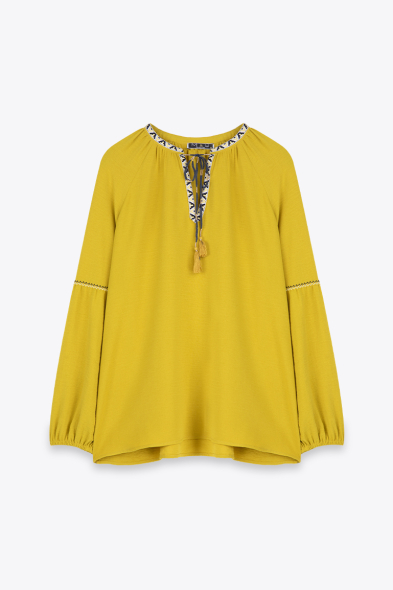 BLOUSE À TAPE ET PICOT